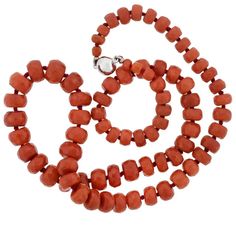 For Sale on 1stDibs - This vintage coral bead necklace is simply stunning! The simple design features a row of graduating coral beads, which are hand strung on red thread, and Luxury Coral Beaded Necklace With Round Beads, Coral Beads Necklace, Red Thread, Coral Beads, Bead Necklace, Simple Design, Live Lokai Bracelet, Design Features, Simple Designs