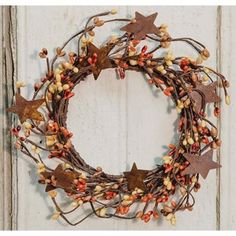 Pumpkin Spice Pip Candle Ring - 4 - Primitive Star Quilt Shop Primitive Houses, Pip Berry Wreath, Brown Candles, Ring Wreath, Tin Star, Pumpkin Spice Candle, Rusty Tin, Candle Ring, Small Wreaths