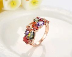 Anneaux de zircon colorés exquis


 Élevez votre style avec notre collection de bagues en zircon coloré. Ces pièces captivantes présentent une superbe gamme de pierres précieuses en zircon dans un spectre de teintes vibrantes, conçues de manière experte pour créer une symphonie de couleurs sur vos doigts. Chaque bague est une œuvre d'art, méticuleusement conçue et sertie de métaux de haute qualité pour garantir une beauté et une durabilité durables. Que vous recherchiez une déclaration audacieuse ou un accent subtil, nos bagues en zircon coloré offrent une façon unique et éblouissante d'exprimer votre individualité. Explorez la fusion du design contemporain et de l'élégance intemporelle avec ces bagues exquises qui passent sans effort des occasions décontractées aux occasions formelles. Multicolor Multi-stone Cluster Ring As Gift, Multicolor Open Ring For Party, Multi-stone Cubic Zirconia Party Rings, Multicolor Cluster Ring With Accent Stones For Anniversary, Party Rings With Multi-stone Cubic Zirconia, Multicolor Gemstone Promise Ring, Multicolor Promise Rings With Gemstone Accents, Multicolor Birthstone Ring With Prong Setting For Wedding, Multicolor Gemstone Ring For Party