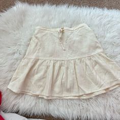 Nwot Super Cute Cream Draw String Mini Skirt Cream Cotton Ruffled Skirt, Cotton Cream Mini Skirt With Lining, Cream Cotton Mini Skirt With Lining, Cotton Mini Skirt With Ruffle Hem, Casual Mini Hem Gathered Skirt, Beige Tiered Cotton Mini Skirt, Beige Cotton Tiered Mini Skirt, Beige Cotton Flared Mini Skirt, Casual Cotton Full Mini Skirt