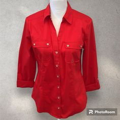 Brand New With Tags!! Pretty Red Button Down Shirt From New York & Company. Shirt Is A Size Medium And Has Two Front Pockets And Cuts In At The Waistline For A Flattering Fit. Sleeves Are Rolled To 3/4 Length. Bin 7 Red Collared Blouse With Pockets, Red Work Shirt With Pockets, Red Workwear Shirt With Pockets, Red Cotton Tops With Button Cuffs, Casual Red Blouse With Pockets, Red Summer Office Shirt, Fitted Red Tops With Snap Buttons, Red Button-up Top With Pockets, Red Collared Top With Button Cuffs