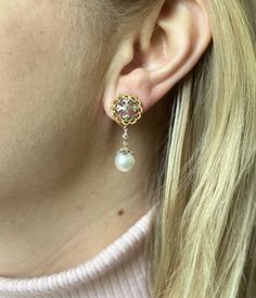 Pair of 18k gold Buccellati earrings, with 9.3mm South Sea pearls. ~ Just purchased inventory from a high end boutique store in Europe. All jewelry is brand new/store samples, with tags ~ DESIGNER: Buccellati MATERIAL: 18k Gold GEMSTONES: Pearl DIMENSIONS: Earrings are 35mm x 15mm. MARKED/TESTED: 18k, Buccellati, Italy. WEIGHT: 11 grams CONDITION: New/Store Sample Luxury White Gold Clip-on Earrings For Formal Occasions, Luxury Pearl Pendant Drop Earrings, Luxury Hallmarked White Gold Clip-on Earrings, Luxury Drop Pearl Earrings With Pendant, Luxury Pearl Drop Earrings With Pendant, Luxury White Gold Hallmarked Clip-on Earrings, Luxury White Gold Pierced Bridal Earrings, Luxury Hallmarked Clip-on Earrings As Gift, Luxury Hallmarked Clip-on Earrings For Gift