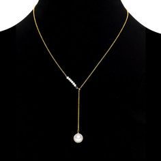 This dainty one of a kind necklace is perfect for under stated charm. It can be worn with casual jeans or that fancy black dress. The real freshwater pearls are attached to a sterling silver chain with yellow gold overlay. The small pearls in a row measure 4mm and the large round pearl is 10mm. The necklace can adjusted from any size 17 inches and less Long Pearl Pendant Necklace For Parties, Long Pearl Necklace With Chain, Pearl White Pearl Necklace With Chain, Chic Pearl Necklace With Adjustable Chain, Chic Pearl Chain Necklace With Adjustable Chain, Chic Pearl Chain Necklaces, Pearl White Pearl Clavicle Chain Necklace, Elegant Adjustable Chain Pearl Necklace, Elegant Adjustable Pearl Necklace With Chain