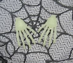 "Glow in the dark skeleton hand hair clips! This listing is for a pair of two clips, as shown. You will receive one right hand and one left hand. They are made of plastic and have a metal alligator clip on the backside. Expose to bright light for several minutes for the glow effect. They measure about 3\" x 1.75\"." Glow In The Dark Skeleton, Dark Skeleton, Glow In The Dark Halloween, Kawaii Hair Clips, Rainbow Choker, Spooky Babe, Halloween Hair Bows, Dark Halloween, Halloween Goth