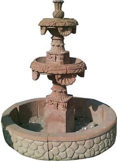 a water fountain is shown on a white background