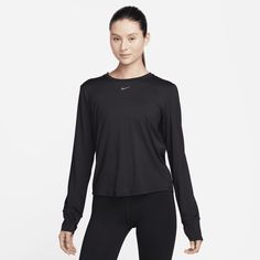 Up for a workout or down to chill, this Nike One Classic top is ready for whatever you are. Lightweight, silky-smooth fabric dries quickly and works for wherever your day takes you. A timeless, easy-fitting style and sweat-wicking tech help you feel confident, comfortable and dry from your morning stroll to your evening wind-down—and at all the stops in between. Trail Shoes Women, Nike T, A Workout, Country Outfits, Feel Confident, Outerwear Women, Fitness Journey, Nike Dri Fit, Workout Tops