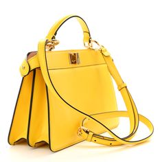 This is an authentic FENDI Vitello King Luxor Shiny Nappa Medium Peekaboo I SEE U East West Satchel in Limone and Light Rose. This stylish bag is crafted of soft calfskin leather in black. The bag features a top handle, an optional shoulder strap, and gold hardware including Fendi logo turn locks on either side. These open to a partitioned pink leather interior with a snap pocket. Fendi Crossbody Bag, Fendi Peekaboo Bag, Fendi Tote Bag, Fendi Tote, Fendi Shoulder Bag, Fendi Peekaboo, Fendi Logo, Python Print, Light Rose