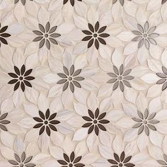 an abstract floral pattern with brown and white flowers