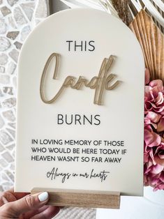 “This Candle Burns in loving memory of those who would be here today if heaven wasn’t so far away” Memorial Stand.Personalise your custom memorial stand to include those in your event who cannot be physically present with us today. This product is totally customisable from the colours of all the materials and types of stands to suit the theme of your event. Acrylic Arch Memorial Sign details: Layered with your choice of MIRROR acrylic text with black or white paint fill engrave. Size: 180mm by 2 Memorial Sign For Wedding Display, In Loving Memory Acrylic Sign, Here Comes The Love Of Your Life Sign, Wedding Small Details Cute Ideas, In Loving Memory Quotes Wedding, This Candle Burns, This Candle Burns In Loving Memory Sign, Remembering Loved Ones Wedding, Loved Ones Memorial Wedding