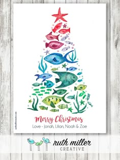 a christmas card with colorful fish and starfish on it, in the shape of a tree