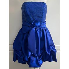 Jessica Mcclintock For Gunne Sax Royal Blue Formal Dress Size 5. New With Tags. Please See Photos. Last Photo Is Best Representation Of Dress Color. Beautiful Royal Blue Dress With A Sequined Bodice And Satin Skirt. Dress Has A Zip Closure With A Hook And Eye. Also Ties At The Waist. Perfect Dress For Homecoming And Other Formal Events. Measurements With Dress Flat: Chest 15" (Armpit To Armpit), Waist 14" (Where Bodice Meets Skirt), Length 27" (Top Of Bodice To Hem). Blue V-neck Dress With Smocked Bodice, Blue V-neck Dress With Ruched Bodice, Carrie Bradshaw Blue Dress, Jessica Mcclintock Wedding Dress, Royal Blue Formal Dress, Dress For Homecoming, Jessica Mcclintock Dress 80s, Blue Formal Dress, Jessica Mcclintock Dress