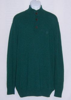 "Vintage Timberland dark pine hunter green wool blend men's sweater. Good pre-owned condition. No holes, snags, fading, rips, tears, excessive piling, etc. Men's size XXL or EXTRA EXTRA LARGE. 40% viscose, 35% nylon, 25% wool. Measurements: chest-54\", length-35\". Three button closure. A great winter piece!" Green Winter Sweater For Outdoor, Green Long Sleeve Polo Sweater For Winter, Green Winter Outdoor Sweater, Green Wool Long Sleeve Sweater, Vintage Green Crew Sweater, Luxury Green Wool Sweater, Forest Green Mens Sweater, Mens Green Sweater, Luxury Green Men's Sweatshirt