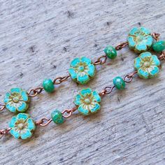 "I love the rich, warm colors of these turquoise beads. I think my favorite combination is with the copper (as shown), but if you are not a copper girl, the antique brass is just as nice. Sure to become a timeless part of your jewelry collection. Why not pick up the whole collection? The small bead is a 3 x 5mm teal bead. The flower bead is a beautiful 10mm, silky turquoise glass bead. All the beads are quality Czech glass beads. I offer them in both copper and antique brass. I am also offering Bohemian Jewelry With 8mm Czech Glass Beads, Handmade Turquoise Czech Glass Bracelets, Handmade Turquoise Bracelets With Czech Glass, Turquoise Czech Glass Bracelets With Colorful Beads, Turquoise Czech Glass Bracelets With Round Beads, Turquoise Czech Glass Bead Bracelets, Turquoise Czech Glass Round Beads Bracelet, Bohemian Turquoise Beaded Bracelets With Czech Glass, Turquoise Czech Glass Bracelets As Gift