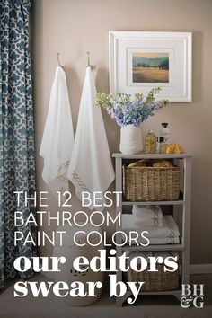 the bathroom is decorated in white and blue with text overlay that reads, the 12 best bathroom paint colors our editorial swear by