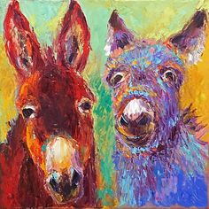 two colorful donkeys are standing next to each other on a green and yellow background