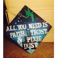 a graduation cap with the words all you need is faith, trust and pixie dust