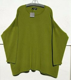 NWT Eskandar GREEN Cashmere Round Neck A-line 32" Long Sweater O/S    COLOR:  GREEN LIME   Round neck, long sleeves and drop shoulders.     All of the measurements are approximate and measured laying flat than doubled.   Since sizes do vary,    so please e-mail me before bidding if you are not sure about sizing.    Bust 62", Hip 64", Hem 70" Length 32" Material 100% Cashmere Made in Scotland by Eskandar  Care Dry Clean or Cool Hand Wash    PLEASE READ NO RETURNS, REFUNDS OR EXCHANGES unless an i Long Sweater, Long Sweaters, Drop Shoulder, Scotland, Bell Sleeve Top, Round Neck, Cashmere, A Line, Dry Clean