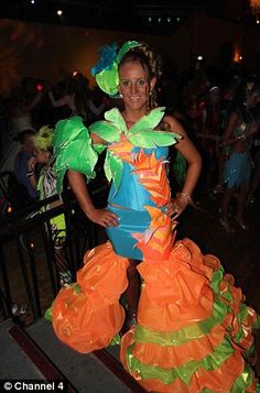 a woman in an orange and green costume