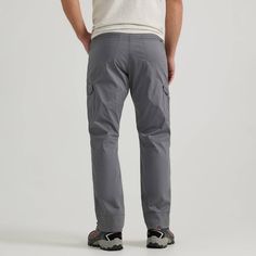 The Wrangler® Outdoor ATG Range Cargo Pant combines the best of Wrangler style with rugged functionality. This regular fit pant features flap cargo pockets, a zippered back pocket, and a reinforced kick plate for enhanced durability, with a gusseted crotch and articulated knees for maximum mobility. With added moisture-wicking properties and UPF 40+ protection, this pant will make sure you stay comfortable and protected in even the toughest environments. Casual Hiking Bottoms With Patch Pockets, Relaxed Fit Cargo Jeans With Functional Pockets For Outdoor, Casual Workwear Bottoms With Multiple Pockets, Casual Bottoms For Outdoor Work With Multiple Pockets, Full-length Cargo Pants With Hip Pockets For Hiking, Casual Cargo Pants With Side Pockets, Midweight Cargo Pants With Straight Leg And Functional Pockets, Midweight Straight Leg Cargo Pants With Functional Pockets, Midweight Cargo Pants With Pockets For Outdoor Work