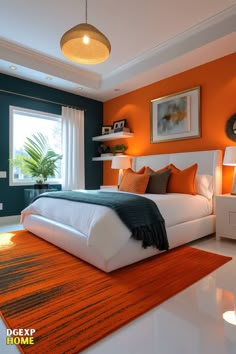 an orange and blue bedroom with white bedding, rugs and pictures on the wall