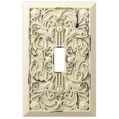 an ornate light switch plate cover