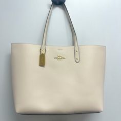 Selling A Light Beige Large Coach Tote Bag. Perfect For Work, School Or Vacation. Has A Beautiful Dark Blue Interior With Gold Accents. Luxury Cream Tote Bag, Elegant Bag For Errands With Handle Drop, Elegant Satchel With Dust Bag For Errands, Luxury Neutral Bags For Formal Occasions, Luxury Cream Shoulder Bag For Shopping, Luxury Cream Bags For Errands, Luxury Cream Shopping Bag, Coach Beige Rectangular Bag, Luxury Cream Bag With Removable Pouch