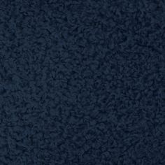 a dark blue textured background that looks like it has been made out of wool