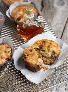 muffins and honey sit on a cooling rack