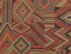 an area rug with many different colors and patterns