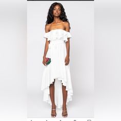 We're Loving The Weather And The Akira Label Days Like These Maxi Dress With Ruffles! This Dress Is Made From A Light White Fabrication, And Is Complete With A Ruffled Chest, Maxi Length, And A High Low Ruffled Hemline. Style This Dress With A Pair Of Platform Sandals, And A Woven Handbag! - 65% Cotton 35% Polyester - Hand Wash Cold- 31"- 51" Shoulder To Hem(Approx. Measured From Small)- Model Is Wearing Size Small- Importedproduct Id: 263335 -Nwt Sleeveless White Maxi Dress With Ruffled Skirt, White Maxi Length Dress With Ruffled Skirt, White Ruffled Maxi Length Dress, White Fitted Ruffle Dress For Summer, White Flirty Ruffle Dress With Ruffled Skirt, White Flirty Ruffle Dress, White Midi Dress With Ruffle Hem For Vacation, White Flowy Ruffle Dress For Party, White Flowy Off-shoulder Midi Dress