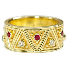 Embrace a touch of contemporary glamour with our Gold Triangle Motif Ring, adorned with the fiery allure of rubies and the brilliant sparkle of diamonds. This uniquely designed piece effortlessly combines modern style with timeless sophistication, making it a captivating addition to your jewelry ensemble. 100% handmade in our workshop. Metal: 18K Gold Gemstones: Rubies weight 0,23 ct Diamonds weight 0,20 ct Ring Size: 7.5 (free sizing) Discover the art of personalization as you select your dream Gold Ruby Ring With Pave Setting For Wedding, Rubies And Diamonds, Gold Triangle, Ringe Gold, Chunky Rings, Ruby Diamond, Dream Jewelry, Ring Size 7, Style Moderne