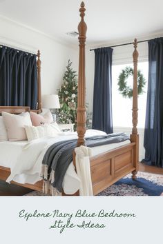 a bed room with a neatly made bed and a christmas tree