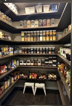 a pantry filled with lots of different types of food and condiments on shelves