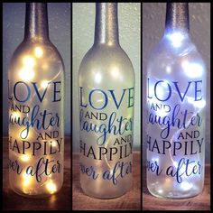 three bottles with lights in them that say love and laughter, happily after after all