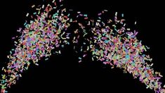 colorful confetti sprinkles on black background