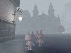 two little rabbits are walking down the street in front of a building with tall spires