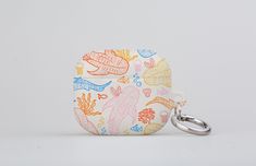 Limited edition, hand-designed whale shark scatter coral reef Apple AirPod cases created in our London studio. Our beautiful whale shark scatter coral reef print features a beige base colour and is adorned with line art whale shark and coral reef illustrations. Like everything in the Harper & Blake store, this hand-drawn creation is made to bring a little joy to your life. With designs you can't find anywhere else, our made-to-order Apple AirPod case designs are lovingly crafted in-house and pri Airpod Cases, Airpods Apple, Air Pods, Whale Shark, Airpod Case, Banks, Wallet Phone Case