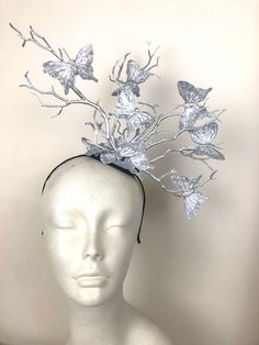 "Derby- Ladies lunch- Easter bonnet- silver headpiece  Hello,           All silver headband with silver branches and silver glitter butterflies. This fascinator is made with butterflies that are 3\" wide. They are perched on branches that are plastic that are painted and will not break as natural ones would. It is attached to a satin covered skinny headband and is adjustable. It's very comfortable and will fit any size head. -------------------------------- I've been making hair pieces over 20 y Adjustable Silver Headpiece For Carnival, Silver Adjustable Headpieces For Carnival, Silver Headband For Evening, Silver Headpieces For Kentucky Derby Party, Silver Headpiece For Party At Royal Ascot, Silver Headpieces For Party At Royal Ascot, Silver Headband Fascinator For Party, Silver Fascinator For Kentucky Derby Party, Silver Evening Fascinator For Kentucky Derby