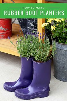 purple rain boots with flowers in them sitting next to a potted plant on the ground