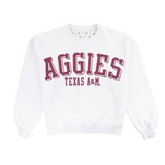 Support your favorite team in style with our Texas A&M Aggies Semi-Pro Janise Crewneck sweatshirt. This white sweatshirt features bold, maroon lettering that proudly states "Aggies Texas A&M". Stay cozy and show your team spirit with this comfortable and stylish sweatshirt! Brand: Pressbox 65% Cotton/35% Polyester Machine Wash Cold/Tumble Dry Low Relaxed Fit Tops With Logo Lettering For Fall, Fall Tops With Logo In Relaxed Fit, Varsity Sweatshirt With University Logo For Game Day, Collegiate Sweatshirt With University Logo For Game Day, White Cotton Sweatshirt With Logo Lettering, Collegiate White Sweatshirt For College, White Sweatshirt With Logo Lettering For Streetwear, White Logo Sweatshirt For Streetwear, White Sporty Sweatshirt With Logo Lettering