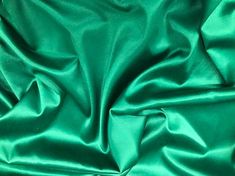 the green fabric is very soft and shiny