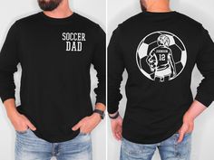 Customize this soccer shirt to meet your needs! Choose from short sleeve, long sleeve, hoodies, and crewneck sweatshirts and add your mascot/team, name, and number! Other color options and styles are available. If you don't see what you're looking for send us a message! The shirts are a UNISEX retail fit - they are more of a relaxed fit and may run a little large on women and those with a smaller frame . Make sure to see the size and fit charts (last images) to confirm the best fit for you. We r Long Sleeve T-shirt With Team Name For Sports Season, White Long Sleeve T-shirt For Father's Day, Long Sleeve T-shirt With Letter Print For Father's Day, Father's Day Long Sleeve Letter Print T-shirt, Father's Day Long Sleeve T-shirt With Letter Print, Team-colored Long Sleeve T-shirt For Sports, Sports Fan Long Sleeve T-shirt, Sports Fan Long Sleeve T-shirt With Letter Print, Long Sleeve Graphic T-shirt For Sports Fans