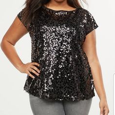 Light Up The Night (Or Day) With This Sparkling Top. Sequined Mesh On The Front Adds Just The Right Amount Of Sparkle To Pair With Jeans For Low-Key Festivities, Or Dress Up With Cool Pants And Heels To Take On The Night. Scoop Neck. Short Sleeves. Crepe. Sequin Mesh Front. Slightly Longer Length. Front Length (On Body): 29.5" Size 18 Is 28" Armpit To Armpit Size 20 Is 30" Armpit To Armpit Machine Wash 100% Polyester Cool Pants, Hot Pink Tops, Light Up The Night, Curvy Swimwear, Big Girl Fashion, Ribbed Knit Top, Puff Sleeve Blouse, Plus Size Top, Sequin Top