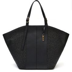 From Ldt, The Tatum Large Black Leather And Straw Panel Tote Bag Features: Pp/Cotton Straw And Nappa Leather Gold-Plated Hardware Inside Zippered Closure 2 Open Media Pockets Adjustable Double Shoulder Straps Approx. 22" L At The Top, 11.5" L At The Base X 14" H X 7" W Imported. Chic Black Bag With Leather Trim, Chic Evening Bags With Leather Trim, Black Shoulder Bag With Leather Trim, Black Shoulder Bag With Leather Trim For Daily Use, Black Shoulder Bag With Leather Trim For Errands, Black Evening Bags With Leather Trim, Black Leather Trim Shoulder Bag For Shopping, Extra Large Tote Bags, Bride Tote Bag