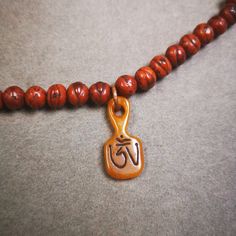 "❤This beautiful bone carved mala clip pendant is hand carved by Tibetan craftsmen from Tibet in 2000's.   From Hepo Town, Baiyu County, the birthplace of the famous Tibetan handicrafts. It is entirely hand-carved,the shape is alphabet means OM Tibet. You can use it as a mala pendant, or a separate necklace pendant,or keychain. ❤These amazing bone beads are handcrafted by artisans from Tibet,who recycle and reuse everything in daily life and spiritual practice. Bone carvings symbolize reincarnat Alphabet Meaning, Bodhi Leaf, Tout Est Possible, Nothing Is Permanent, Buddhist Teachings, Tibetan Jewelry, Water Buffalo, Bone Color, Everything Is Possible