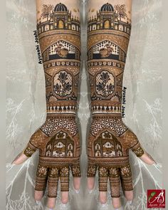 the hands are decorated with intricate designs