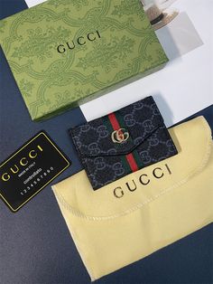 Luxurious Material: Crafted from high-quality materials, the Gucci Adjustable Crossbody LV Accordion Card Holder showcases a combination of Gucci's signature design elements and LV's iconic monogram pattern. The luxurious leather construction ensures durability and a premium feel. Adjustable Crossbody Strap: The accessory features an adjustable crossbody strap, providing versatile carrying options. Whether worn across the body or over the shoulder, this strap ensures comfort and convenience f... Luxury Wallets With Multiple Compartments, Luxury Elegant Wallets With Multiple Compartments, Luxury Black Card Holder As Gift, Luxury Black Card Holder Gift, Luxury Black Card Holder For Gift, Black Envelope Wallet As A Gift, Trendy Black Card Holder As Gift, Accordion Cards, Luxury Phone Case