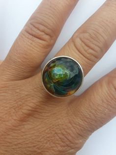 Check out this item in my Etsy shop https://www.etsy.com/listing/715870501/sterling-silver-hammered-colorful-glass Unique Multicolor Rings With Polished Finish, Artistic Hand Painted Round Rings, Artsy Round Green Jewelry, Modern Iridescent Round Rings, Modern Iridescent Round Ring, Modern Multicolor Handmade Rings, Unique Multicolor Cabochon Rings, Multicolor Handmade Fusion Rings, Raw Quartz Crystal