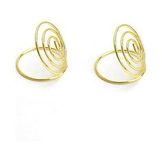 two gold rings with spiral designs on each side, one in the middle and one in the