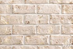 a white brick wall that is very close up